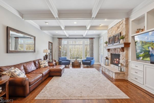 Fireplace, Interior, Living room, Recessed Lighting, Stone Walls, Wood Texture Flooring