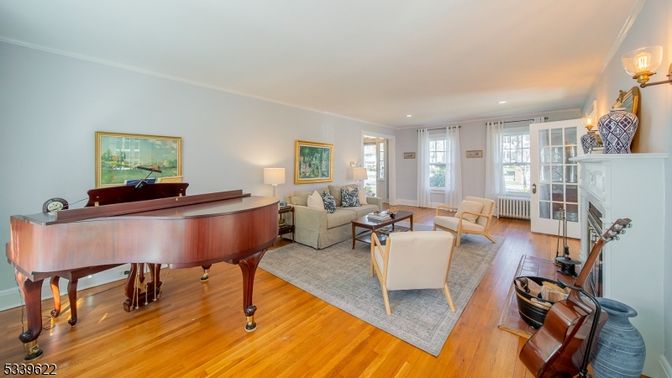 Fireplace, Interior, Living room, Piano, Recessed Lighting, Wood Texture Flooring