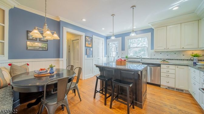 Dining room, Interior, Kitchen, Pendant Lights, Recessed Lighting, Stainless Steel Appliances, Wood Texture Flooring
