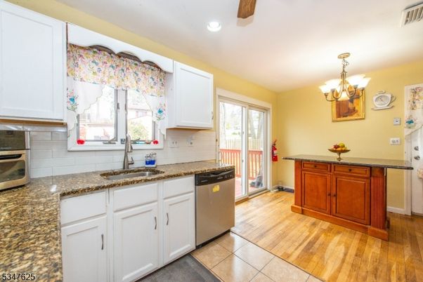 Chandelier, Interior, Kitchen, Recessed Lighting, Stainless Steel Appliances, Wood Texture Flooring
