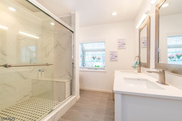 Bathroom, Glass Shower, Interior, Marble Walls, Recessed Lighting, Wood Texture Flooring
