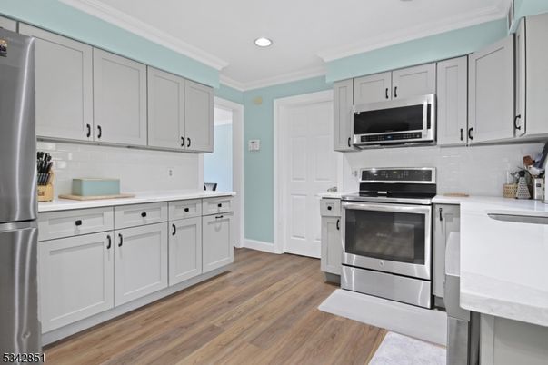 Interior, Kitchen, Recessed Lighting, Stainless Steel Appliances, Wood Texture Flooring