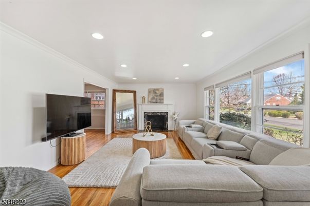 Fireplace, Interior, Living room, Recessed Lighting, Wood Texture Flooring