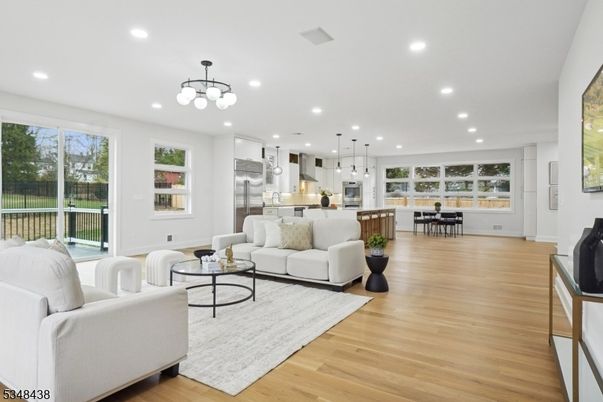 Dining room, Interior, Kitchen, Living room, Pendant Lights, Recessed Lighting, Stainless Steel Appliances, Wood Texture Flooring
