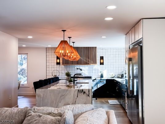 Chandelier, Interior, Kitchen, Living room, Recessed Lighting, Stainless Steel Appliances, Wood Texture Flooring