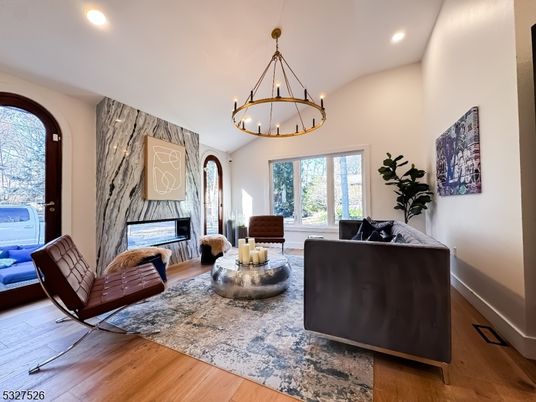 Chandelier, Fireplace, Interior, Living room, Pendant Lights, Recessed Lighting, Wood Texture Flooring
