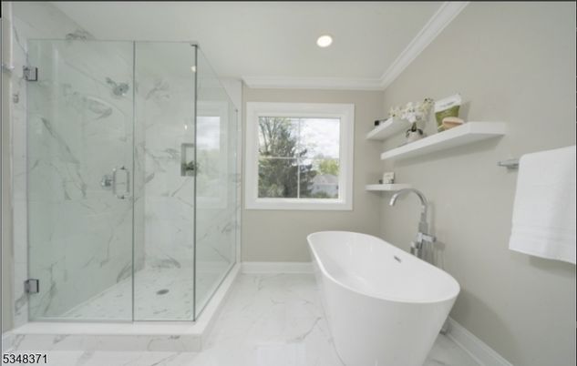 Bathroom, Free Standing Baths, Glass Shower, Interior, Marble, Marble Walls, Recessed Lighting