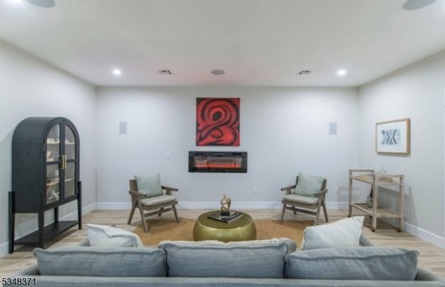 Fireplace, Interior, Living room, Recessed Lighting, Wood Texture Flooring