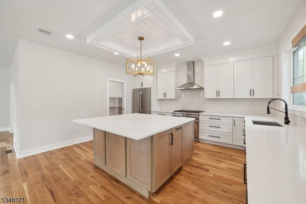 Chandelier, Interior, Kitchen, Pendant Lights, Recessed Lighting, Stainless Steel Appliances, Wood Texture Flooring