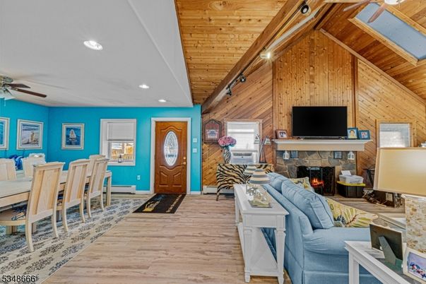 Dining room, Fireplace, Interior, Living room, Recessed Lighting, Wooden Ceilings, Wood Texture Flooring, Wooden Walls