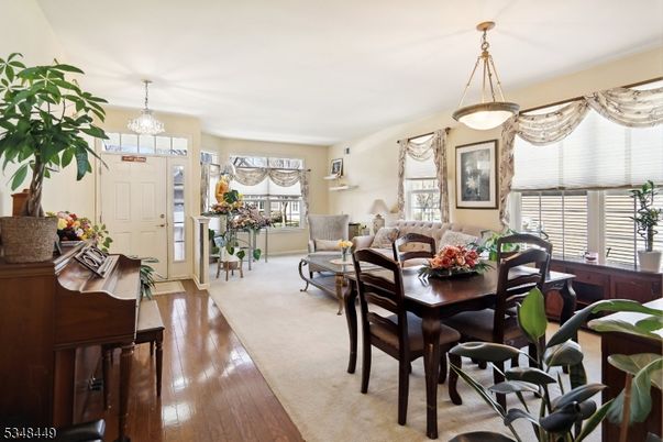 Chandelier, Dining room, Interior, Living room, Pendant Lights, Piano, Wood Texture Flooring