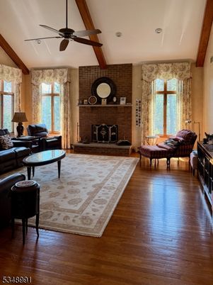 Fireplace, Interior, Living room, Stone Walls, Wooden Beams, Wood Texture Flooring
