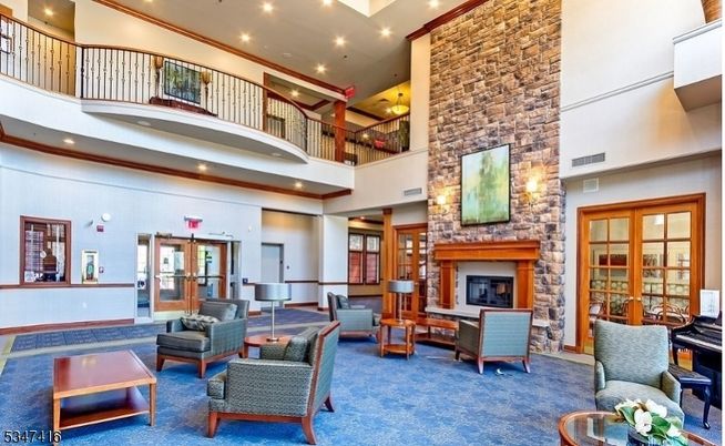 Fireplace, Interior, Living room, Piano, Recessed Lighting, Stone Walls