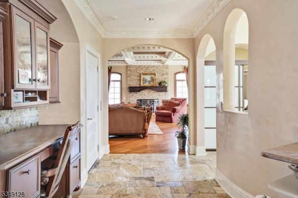 Fireplace, Interior, Living room, Recessed Lighting, Stone Walls, Wood Texture Flooring