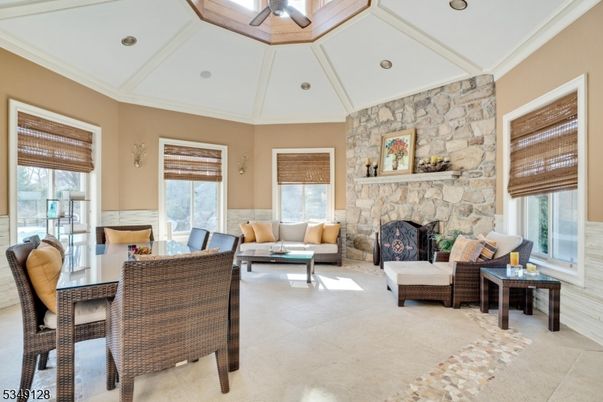 Dining room, Fireplace, Interior, Living room, Recessed Lighting, Stone Walls