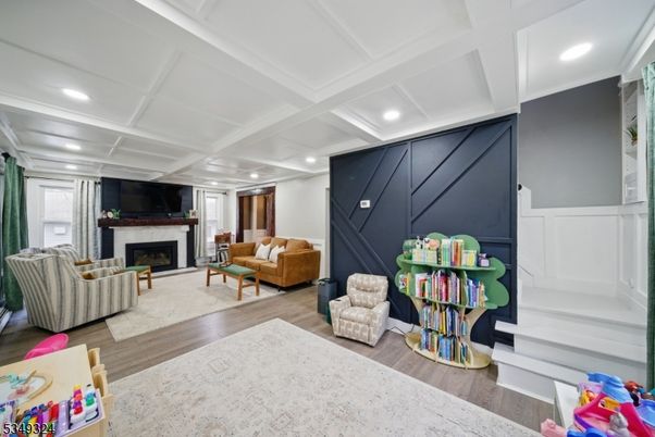 Fireplace, Interior, Living room, Recessed Lighting, Wood Texture Flooring