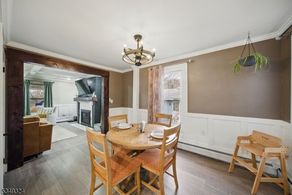 Chandelier, Dining room, Fireplace, Interior, Wood Texture Flooring