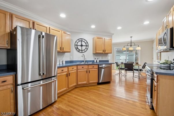 Dining room, Interior, Kitchen, Pendant Lights, Recessed Lighting, Stainless Steel Appliances, Wood Texture Flooring