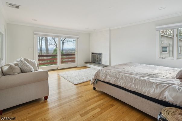 Bedroom, Fireplace, Interior, Recessed Lighting, Wood Texture Flooring