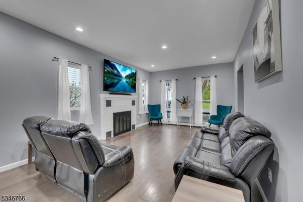 Fireplace, Interior, Living room, Recessed Lighting, Wood Texture Flooring