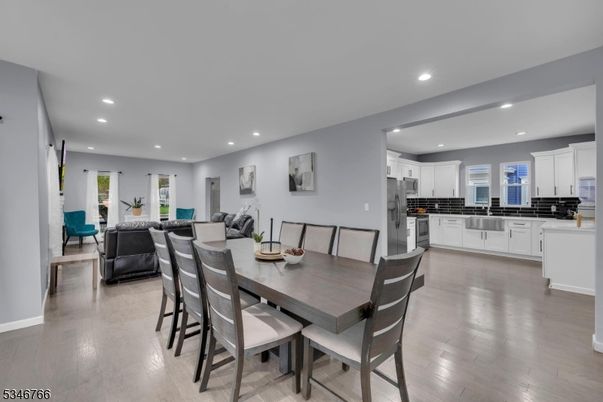 Dining room, Interior, Kitchen, Recessed Lighting, Stainless Steel Appliances, Wood Texture Flooring