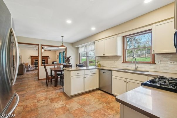 Dining room, Interior, Kitchen, Living room, Pendant Lights, Recessed Lighting, Stainless Steel Appliances