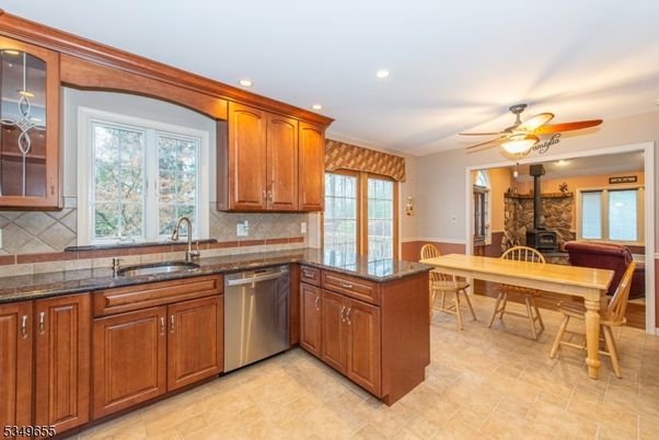 Dining room, Fireplace, Interior, Kitchen, Recessed Lighting, Stone Walls