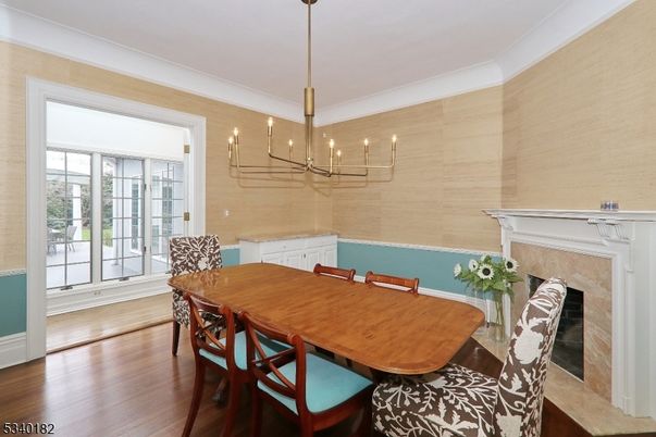 Chandelier, Dining room, Fireplace, Interior, Pendant Lights, Wood Texture Flooring