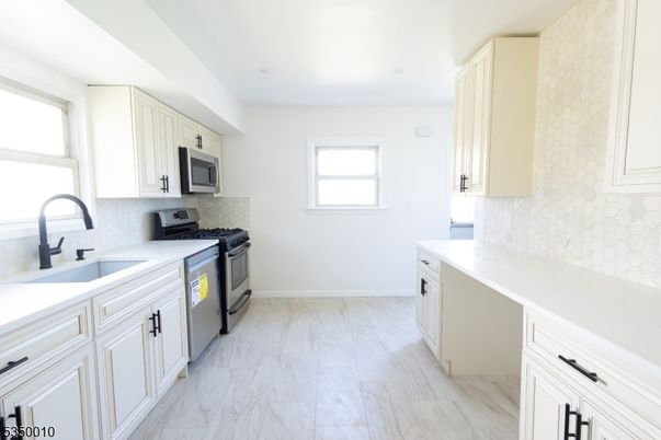 Interior, Kitchen, Marble, Recessed Lighting, Stainless Steel Appliances