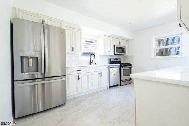 Interior, Kitchen, Marble, Recessed Lighting, Stainless Steel Appliances
