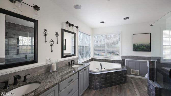 Bathroom, Dual Sink Vanities, Glass Shower, Interior, Recessed Lighting, Wood Texture Flooring