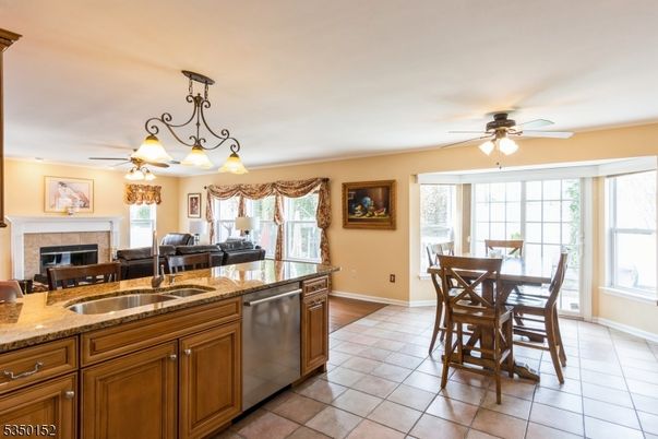 Chandelier, Dining room, Fireplace, Interior, Kitchen, Wood Texture Flooring