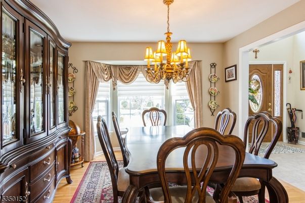 Chandelier, Dining room, Interior, Wood Texture Flooring