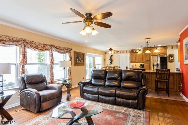 Dining room, Interior, Kitchen, Living room, Pendant Lights, Stainless Steel Appliances, Wood Texture Flooring