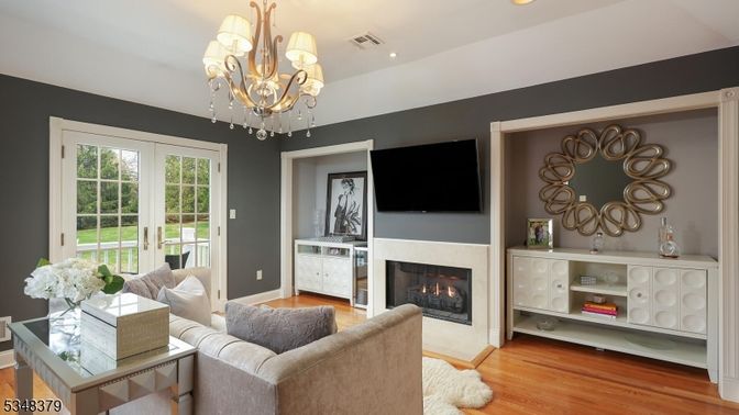 Chandelier, Fireplace, Interior, Living room, Recessed Lighting, Wood Texture Flooring