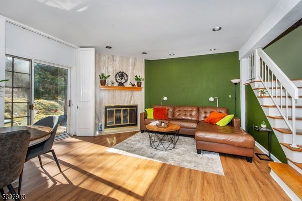 Fireplace, Interior, Living room, Recessed Lighting, Wood Texture Flooring
