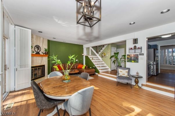 Dining room, Fireplace, Interior, Recessed Lighting, Wood Texture Flooring