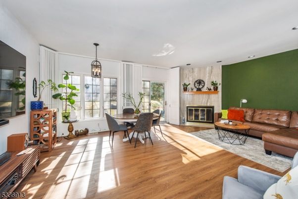 Dining room, Fireplace, Interior, Living room, Pendant Lights, Wood Texture Flooring