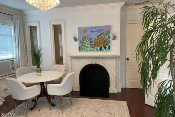 Chandelier, Dining room, Fireplace, Interior, Wood Texture Flooring