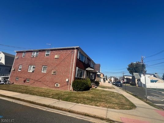 Exterior, Facade, Brick Facade, Condo Building
