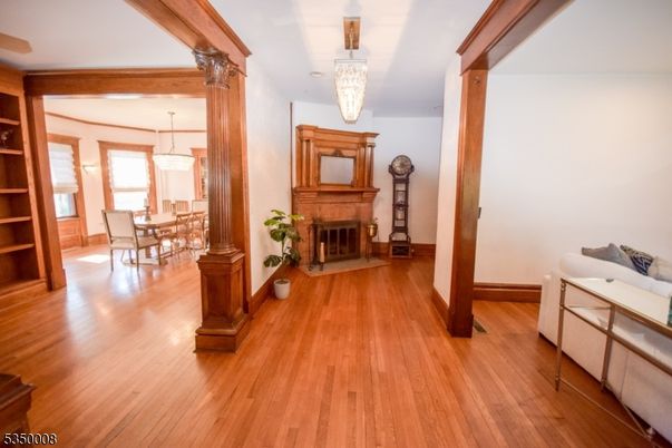 Chandelier, Dining room, Fireplace, Interior, Wood Texture Flooring
