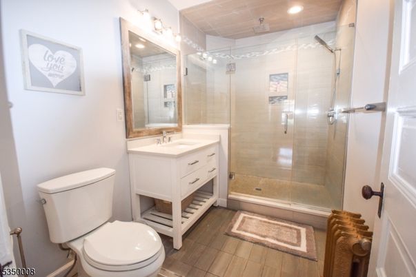 Bathroom, Glass Shower, Interior, Recessed Lighting, Wood Texture Flooring