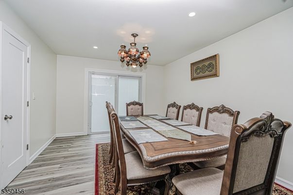Chandelier, Dining room, Interior, Recessed Lighting, Wood Texture Flooring
