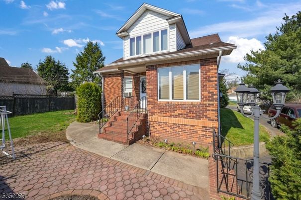 Exterior, Facade, Brick Facade, American Foursquare