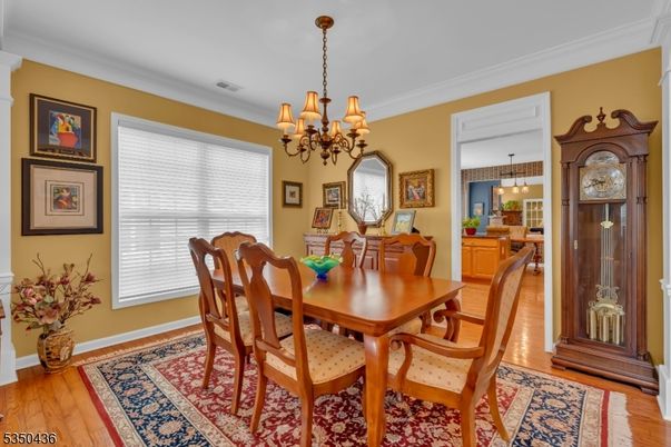 Chandelier, Dining room, Interior, Pendant Lights, Wood Texture Flooring