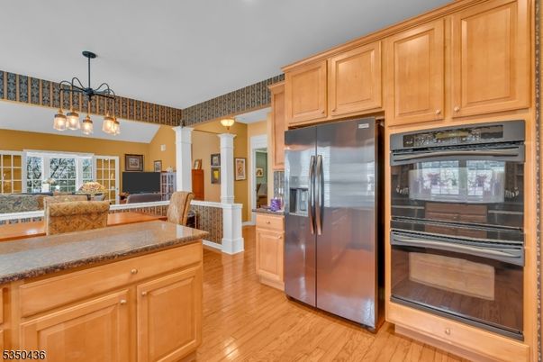 Dining room, Interior, Kitchen, Pendant Lights, Stainless Steel Appliances, Wood Texture Flooring