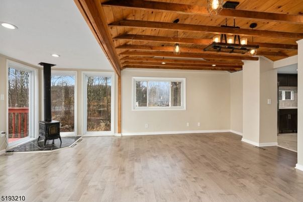 Empty room, Fireplace, Interior, Recessed Lighting, Wooden Beams, Wooden Ceilings, Wood Texture Flooring