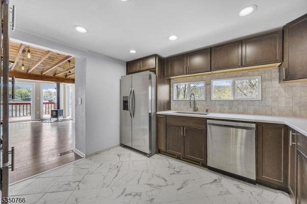 Interior, Kitchen, Marble, Pendant Lights, Recessed Lighting, Stainless Steel Appliances, Wooden Ceilings