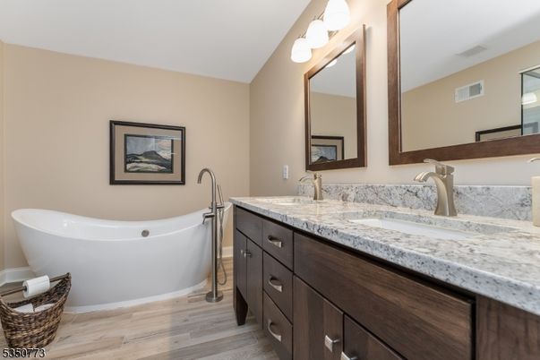 Bathroom, Dual Sink Vanities, Free Standing Baths, Interior, Wood Texture Flooring