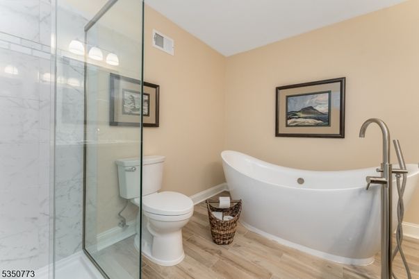 Bathroom, Glass Shower, Interior, Marble Walls, Wood Texture Flooring